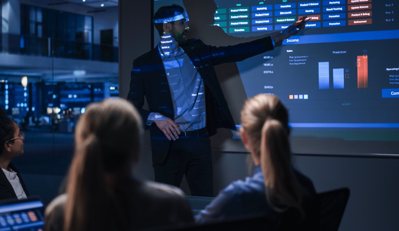 Executive presenting a strategic shareout